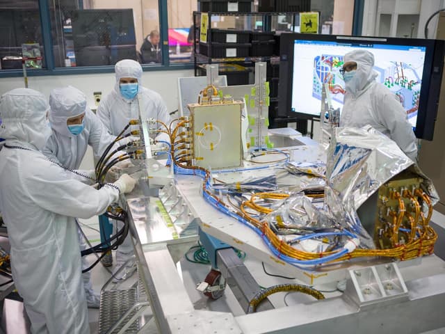 Engineers Assemble Electronics Layer on Roman Coronagraph Instrument